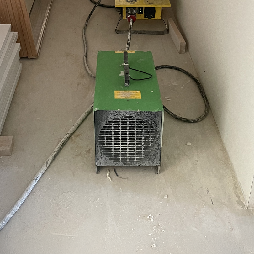 Performance Insulation heater in the hallway of a job site